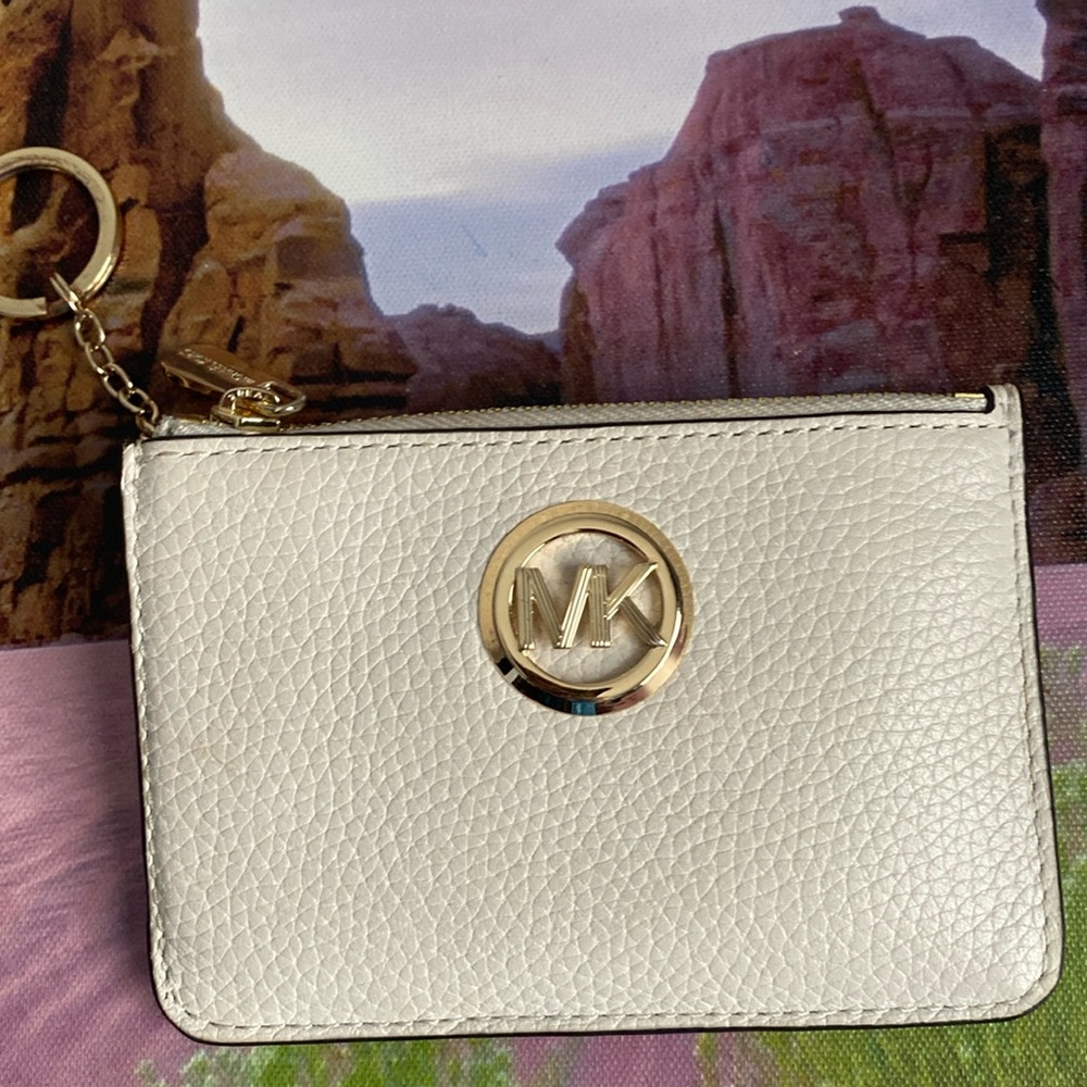 Michael Kors small zip Leather wallet.